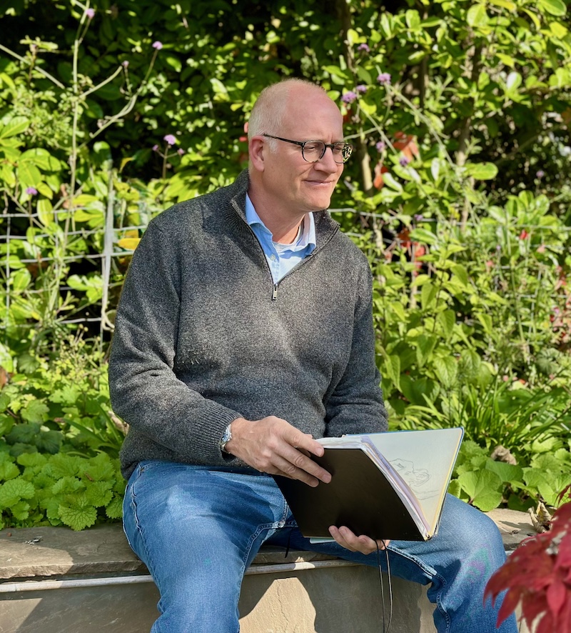 Portrait of Piers Clemett in a garden